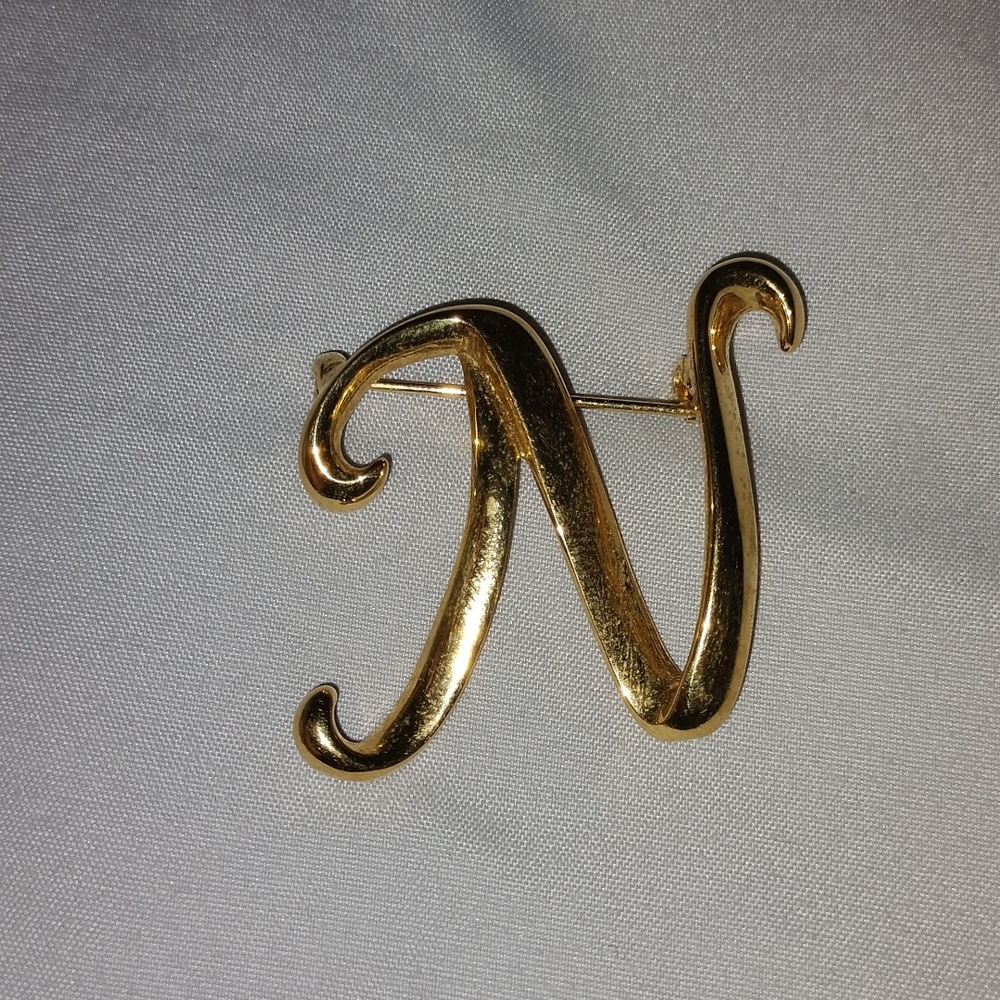 Signature brooch